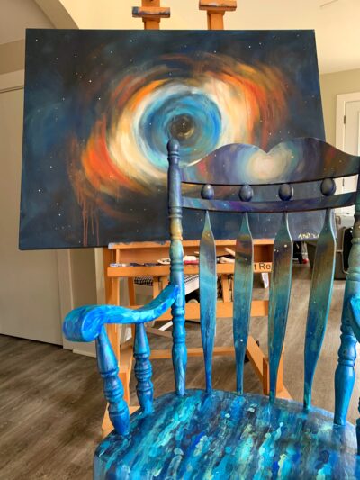 Eye of God painting and Galaxies into the River of Life Rocker